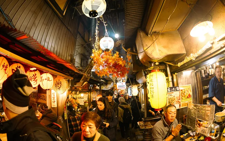 Warm red lanterns in Omoide Yokocho